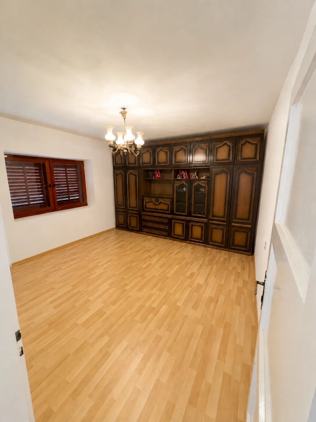 Master bedroom with built-in wardrobe wall