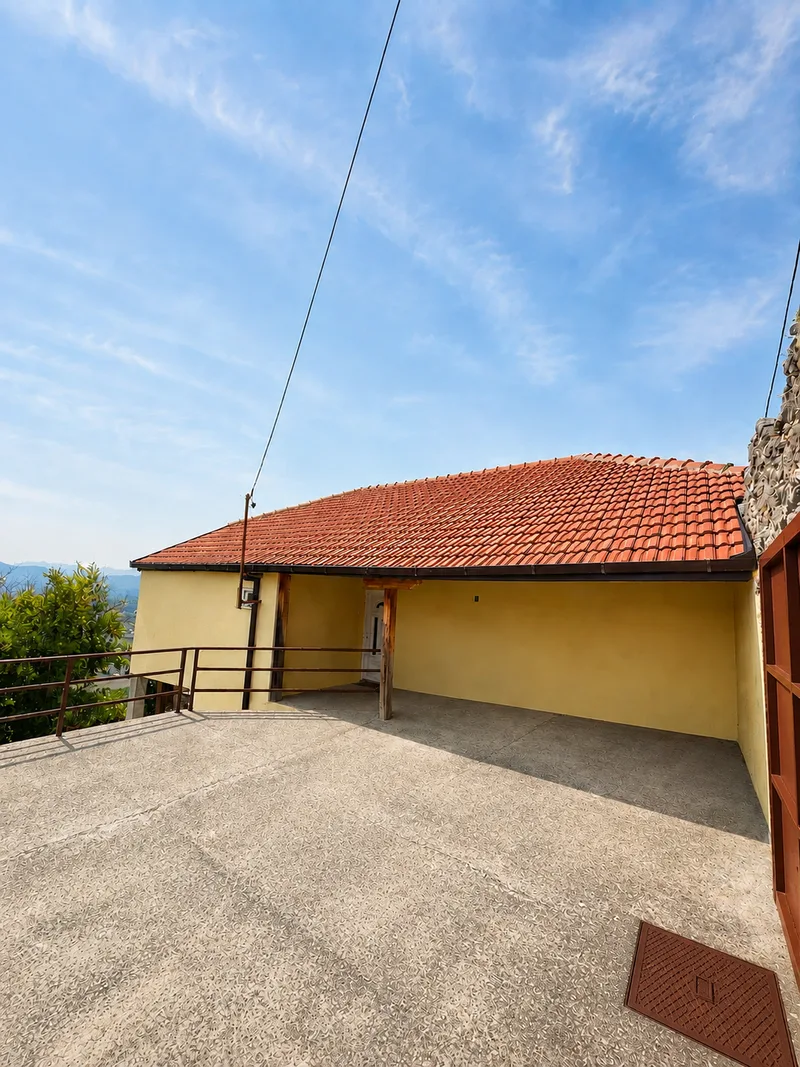 House facade and parking area