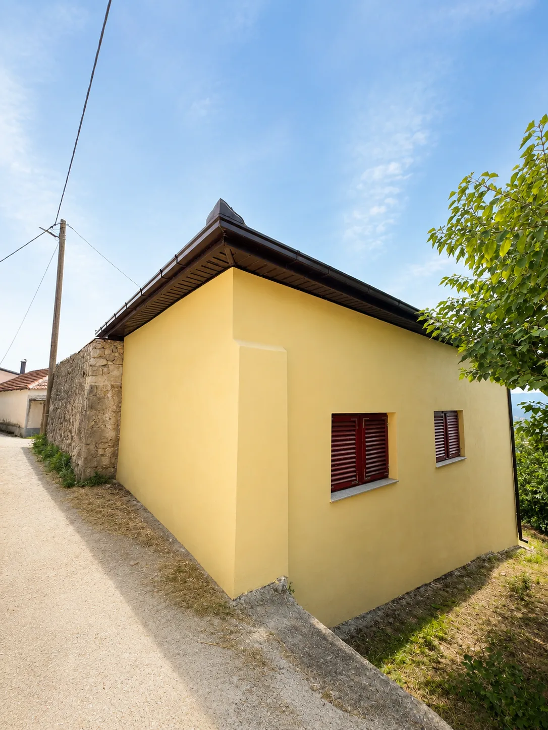 Exterior view of the house with surroundings